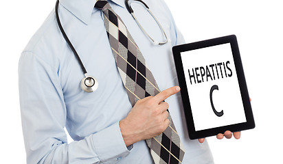 Image showing Doctor holding tablet - Hepatitis C