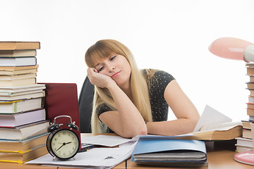 Image showing Student falls asleep looking at the screen