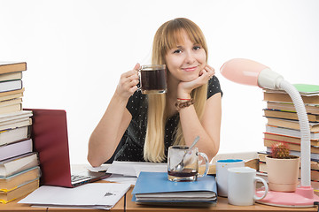 Image showing Student drinking another cup of coffee by preparing for the exam at night