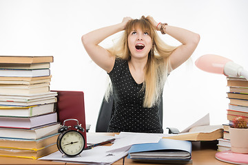 Image showing Student tears his hair out of nervous tension