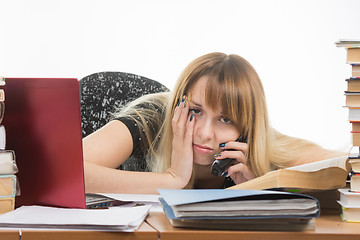 Image showing Tired researcher is calling on the phone