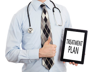 Image showing Doctor holding tablet - Treatment plan