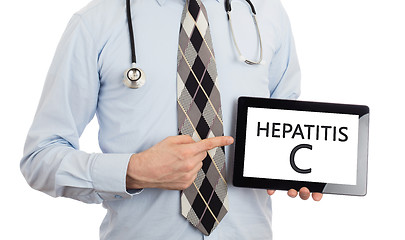 Image showing Doctor holding tablet - Hepatitis C