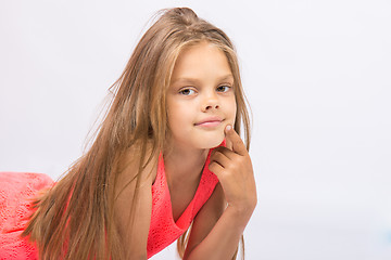 Image showing Portrait of a seven-year Conceived girl on a white background
