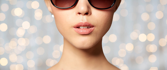 Image showing close up of beautiful woman in black sunglasses