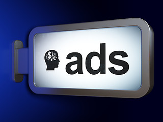 Image showing Advertising concept: Ads and Head With Finance Symbol on billboard background