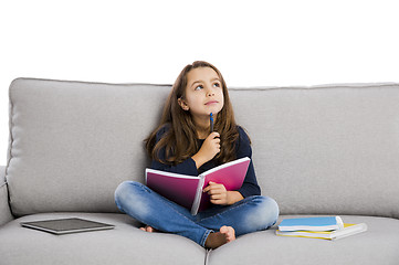 Image showing LIttle girl studying