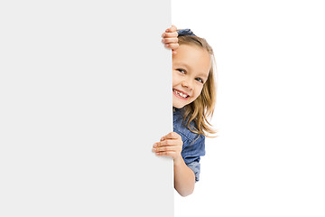 Image showing Cute Girl holding a whiteboard