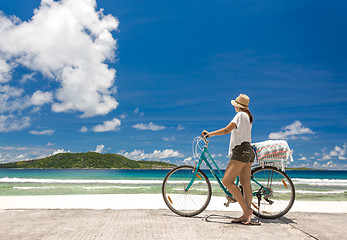 Image showing Woman ride along The Beach