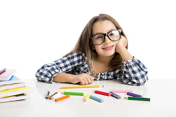 Image showing Little girl making drawings