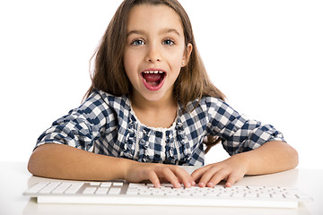 Image showing Little girl working with a computer