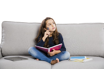 Image showing LIttle girl studying