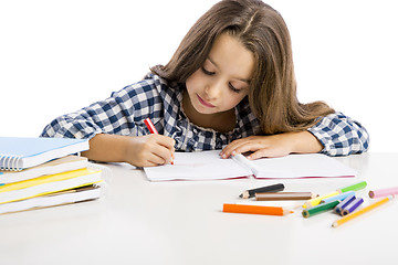 Image showing Little girl making drawings