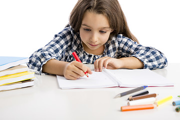 Image showing Little girl making drawings