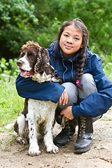 Image showing Girl with a dog