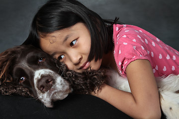 Image showing Child and dog