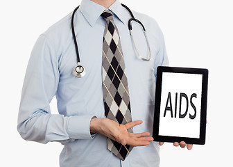 Image showing Doctor holding tablet - Aids