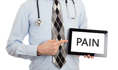 Image showing Doctor holding tablet - Pain