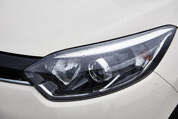 Image showing raindrops on car in rainy season