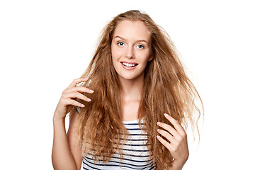 Image showing Beautiful young woman with flying hair
