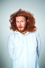 Image showing Portrait of young man with shocked facial expression