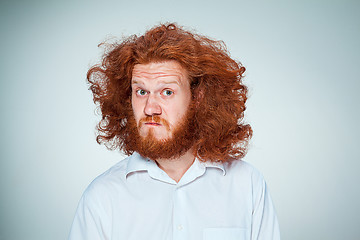 Image showing Portrait of young man with shocked facial expression