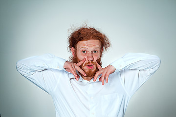 Image showing Portrait of young man with shocked facial expression