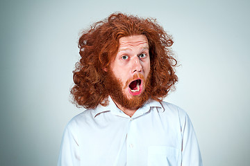 Image showing Portrait of young man with shocked facial expression