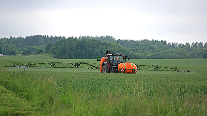 Image showing Tractor and Sprayer on Wheat Field