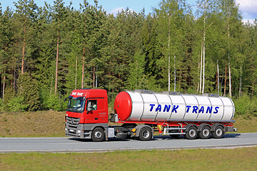 Image showing Red Mercedes-Benz Actros Semi Tank Truck on Freeway