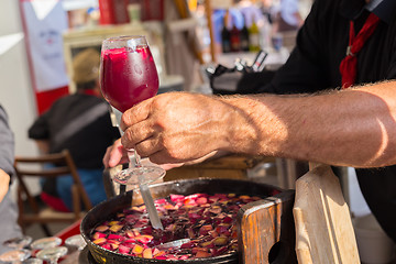 Image showing Refreshing sangria served on food stall.
