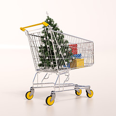 Image showing Shopping cart full of purchases in packages and Christamas tree