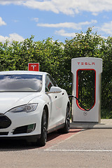 Image showing White Tesla Model S Electric Car Charging Battery