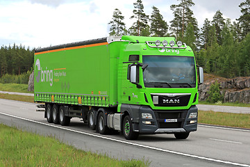 Image showing Lime Green MAN TGX Cargo Truck on Motorway