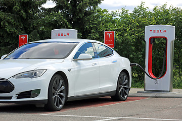 Image showing White Tesla Model S Electric Car Charging Battery