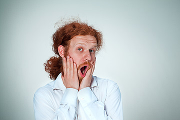 Image showing Portrait of young man with shocked facial expression