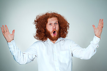 Image showing Portrait of young man with shocked facial expression