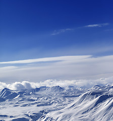 Image showing View from ski resort on snowy mountains