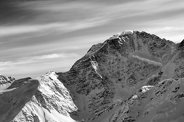 Image showing Black and white winter mountains at sun morning