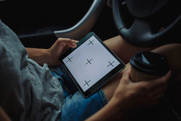 Image showing woman with tablet in the car