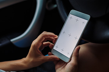 Image showing woman with the phone in the car