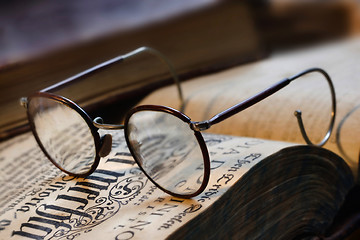 Image showing vintage books and glasses