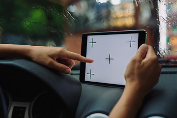 Image showing woman with tablet in the car