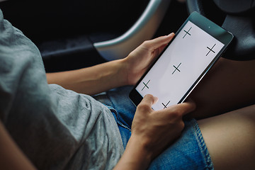 Image showing woman with tablet in the car