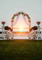 Image showing Wedding arch decorated with flowers