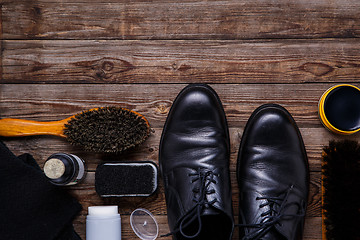 Image showing Shoe wax, brush and boot