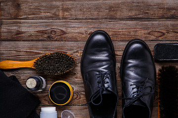 Image showing Shoe wax, brush and boot