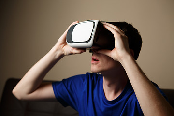 Image showing Man wearing virtual reality goggles.