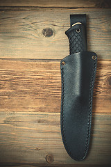 Image showing hunting knife in a leather scabbard