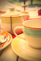 Image showing Black fruit tea is brewed in a teapot